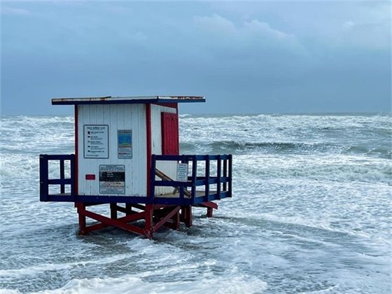 Lifeguard Tower surrounded by water as storm surge comes into Cocoa Beach